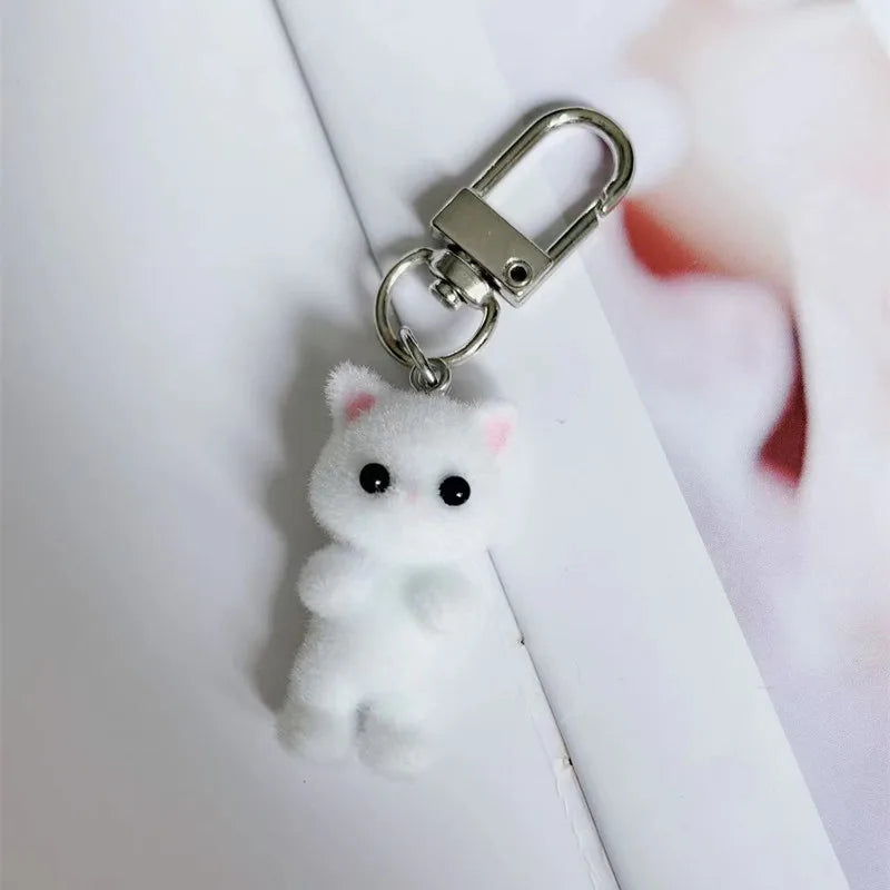 ZAKOL Cute Flocking Cat Keychain 3D Love Phone Pendant Headphone Charm Bag Decor Car Key Ring Jewelry Gift