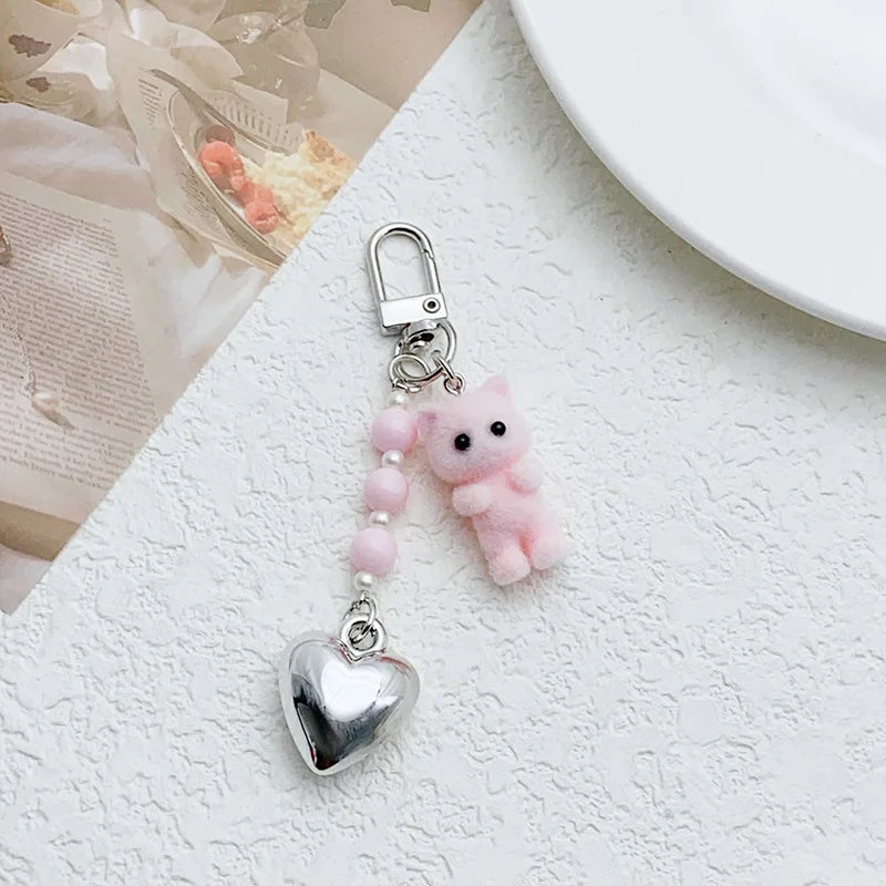 ZAKOL Cute Flocking Cat Keychain 3D Love Phone Pendant Headphone Charm Bag Decor Car Key Ring Jewelry Gift