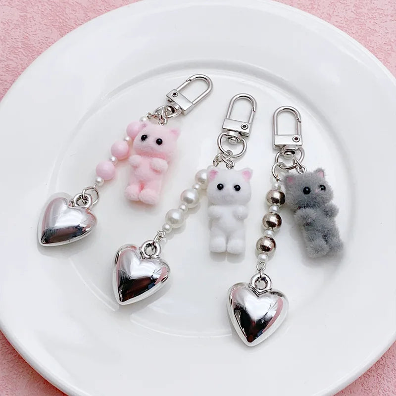 ZAKOL Cute Flocking Cat Keychain 3D Love Phone Pendant Headphone Charm Bag Decor Car Key Ring Jewelry Gift