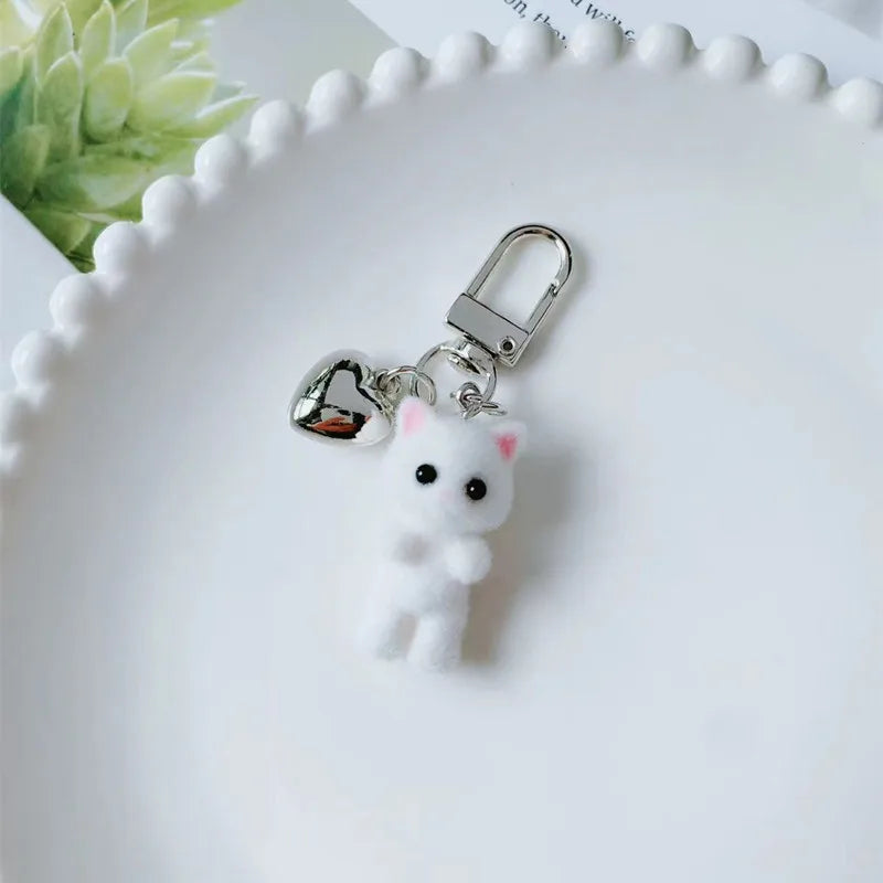 ZAKOL Cute Flocking Cat Keychain 3D Love Phone Pendant Headphone Charm Bag Decor Car Key Ring Jewelry Gift
