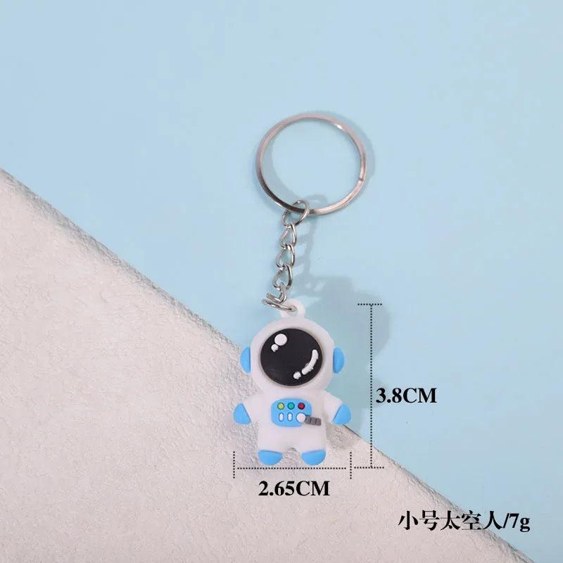 1PCS PVC Cartoon Planet Tour Astronaut Keychain Cute Astronaut Couple Chain Soft Rubber Small Pendant Key Ring Gift Aesthetic